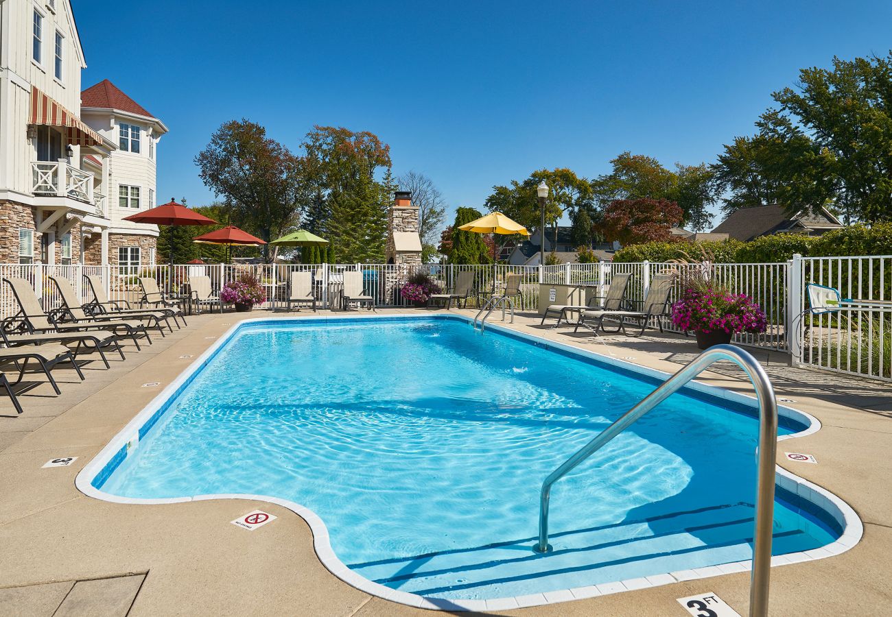 Relaxing swimming pool area with seating 