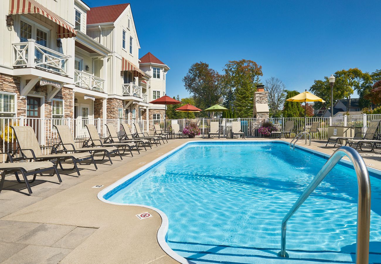 Swimming pool with outside seating 