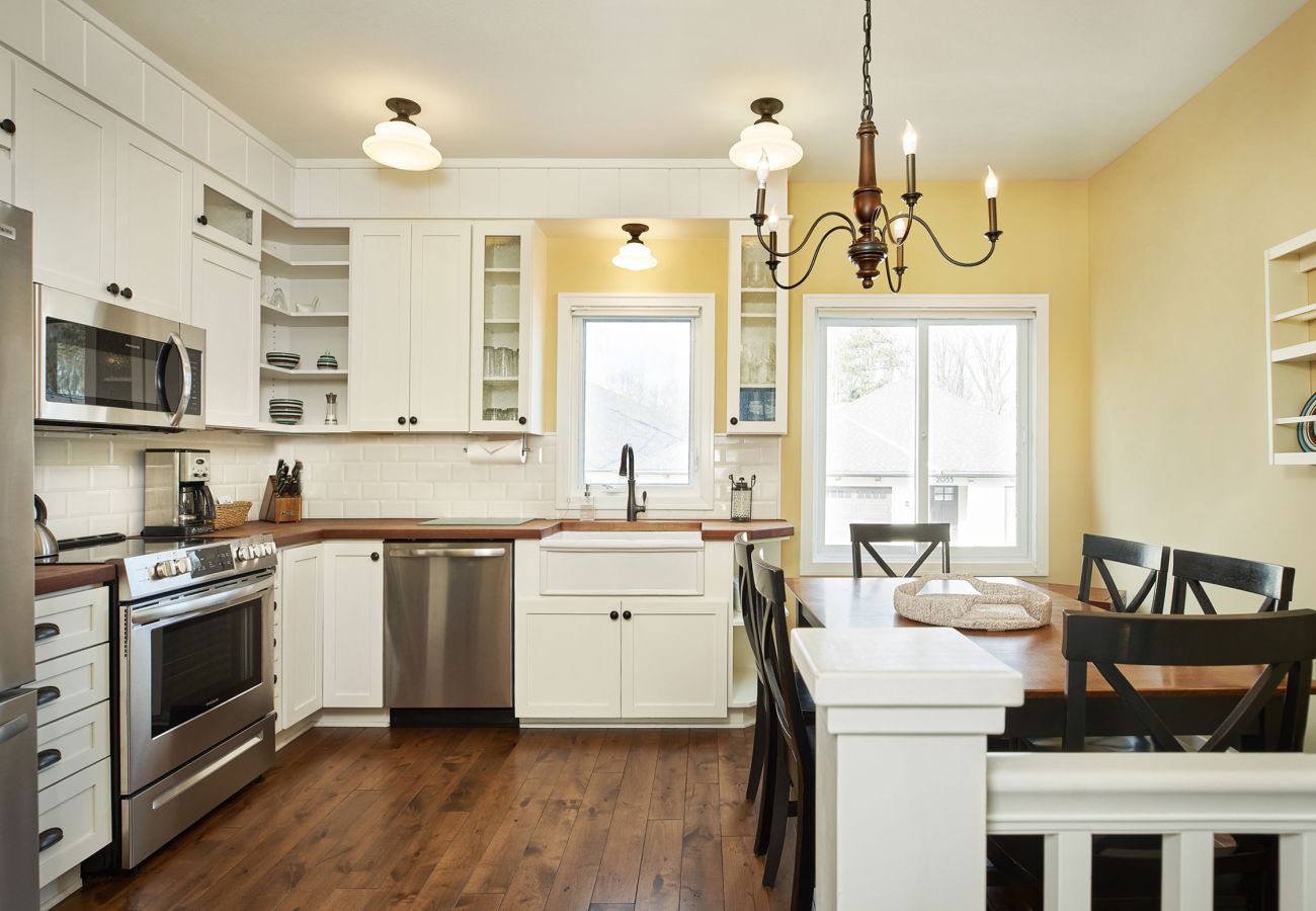 Kitchen on second floor, includes full fridge, dishwasher, oven, stove, microwave and sink